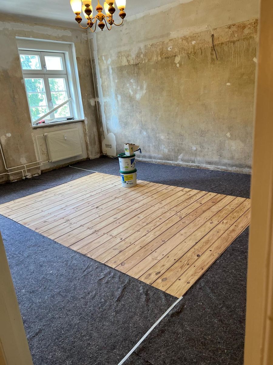 In progress: damaged boards replaced, area protected