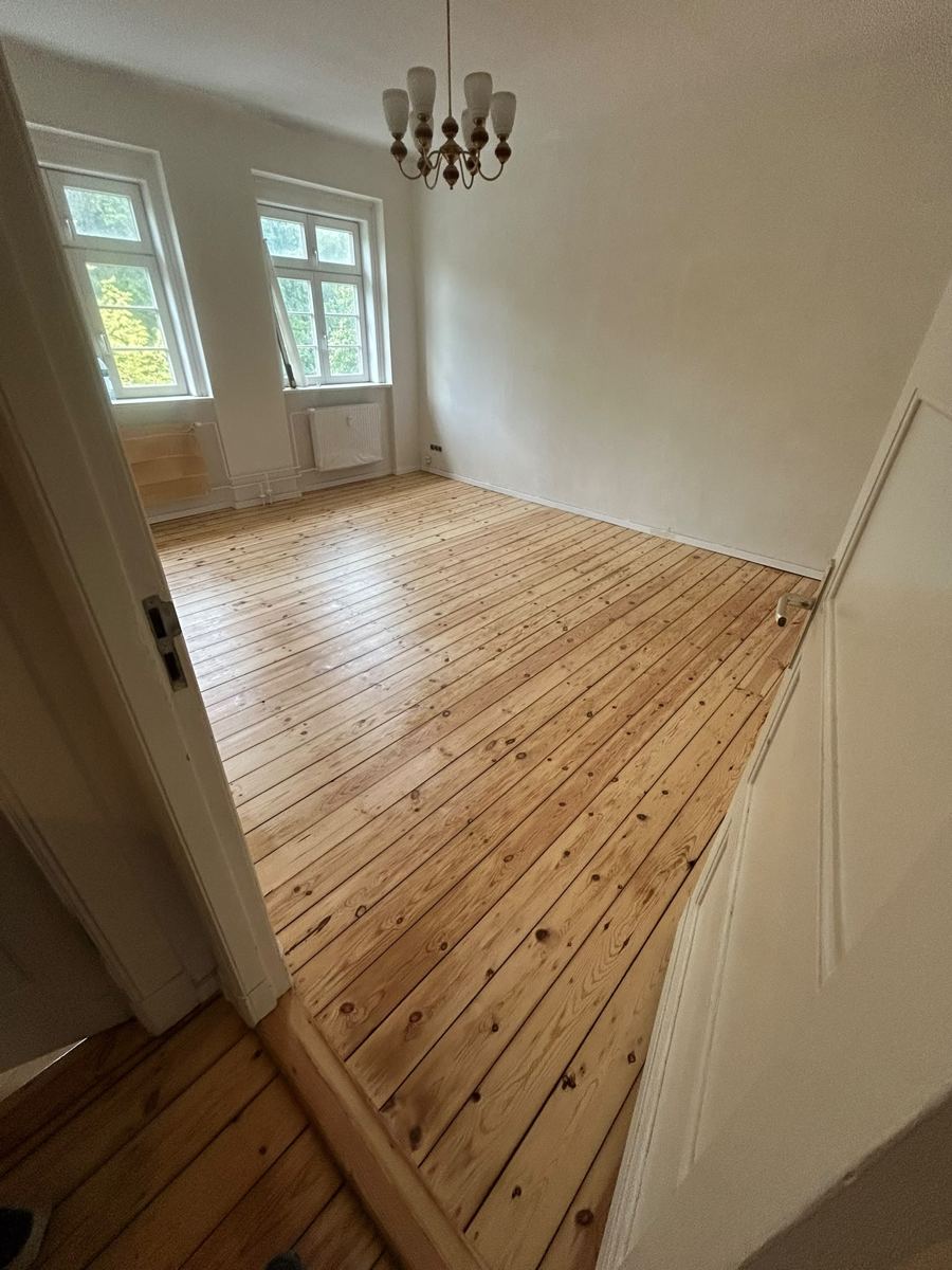Second room with fully restored pine floorboards