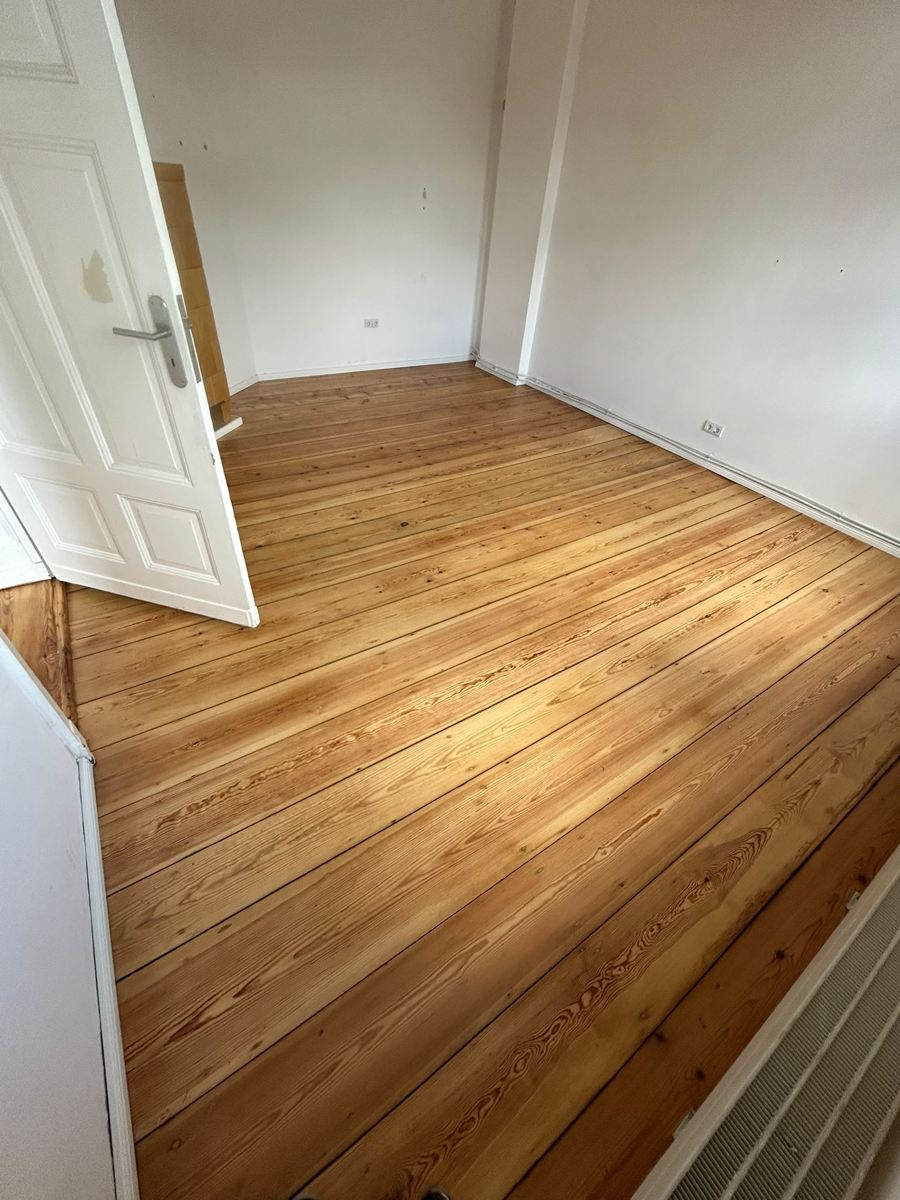 Fully restored floorboard area, second room