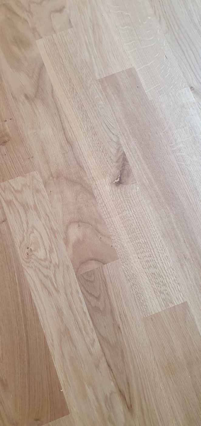 Close-up of light oak strip parquet