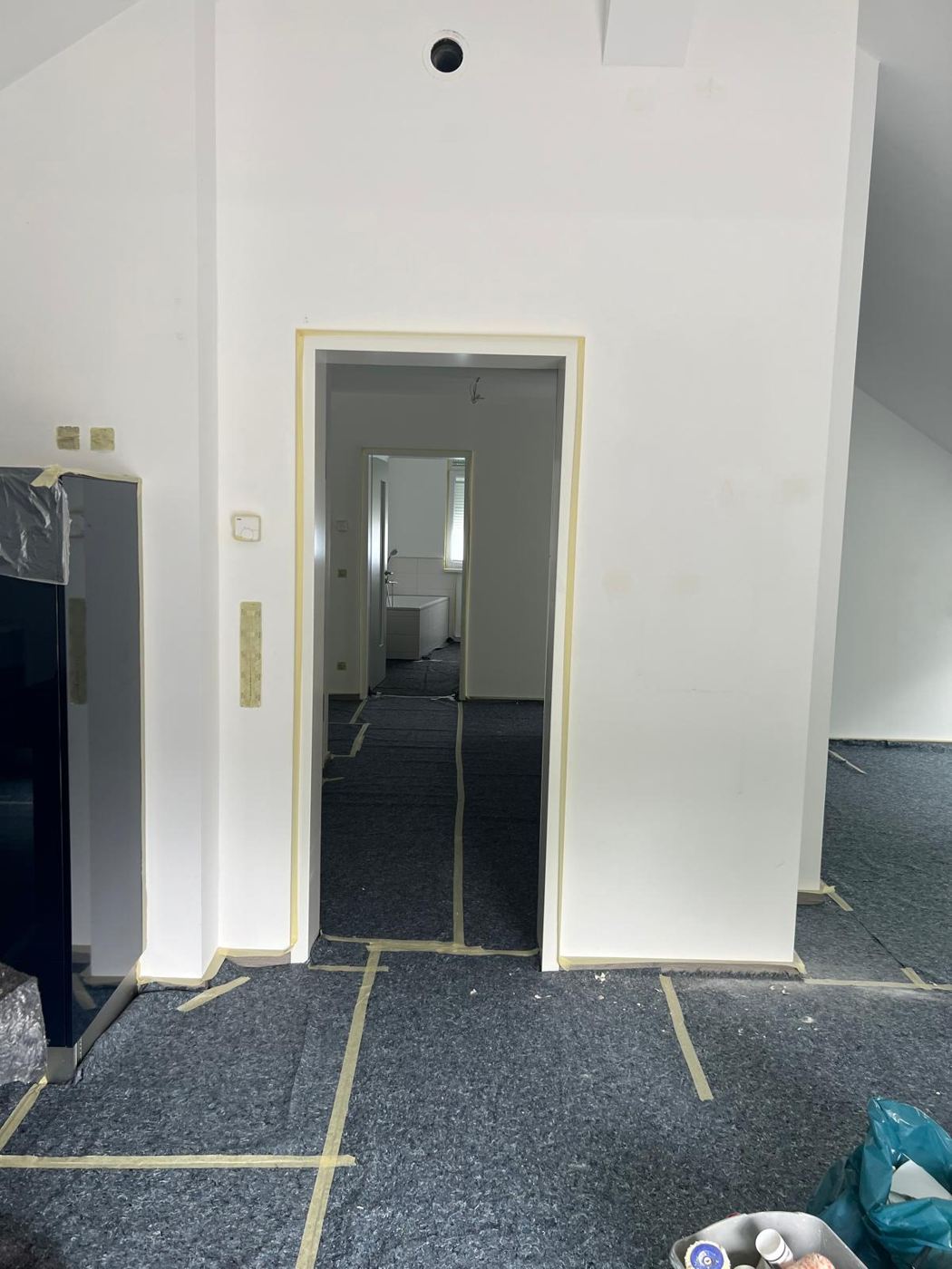 Kitchen front masked in detail during painting work